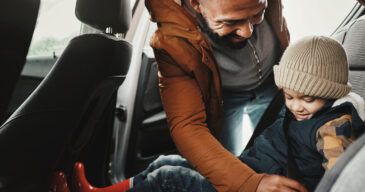 Father, help or child with seat belt for safety traveling on vacation, road trip or holiday in car .